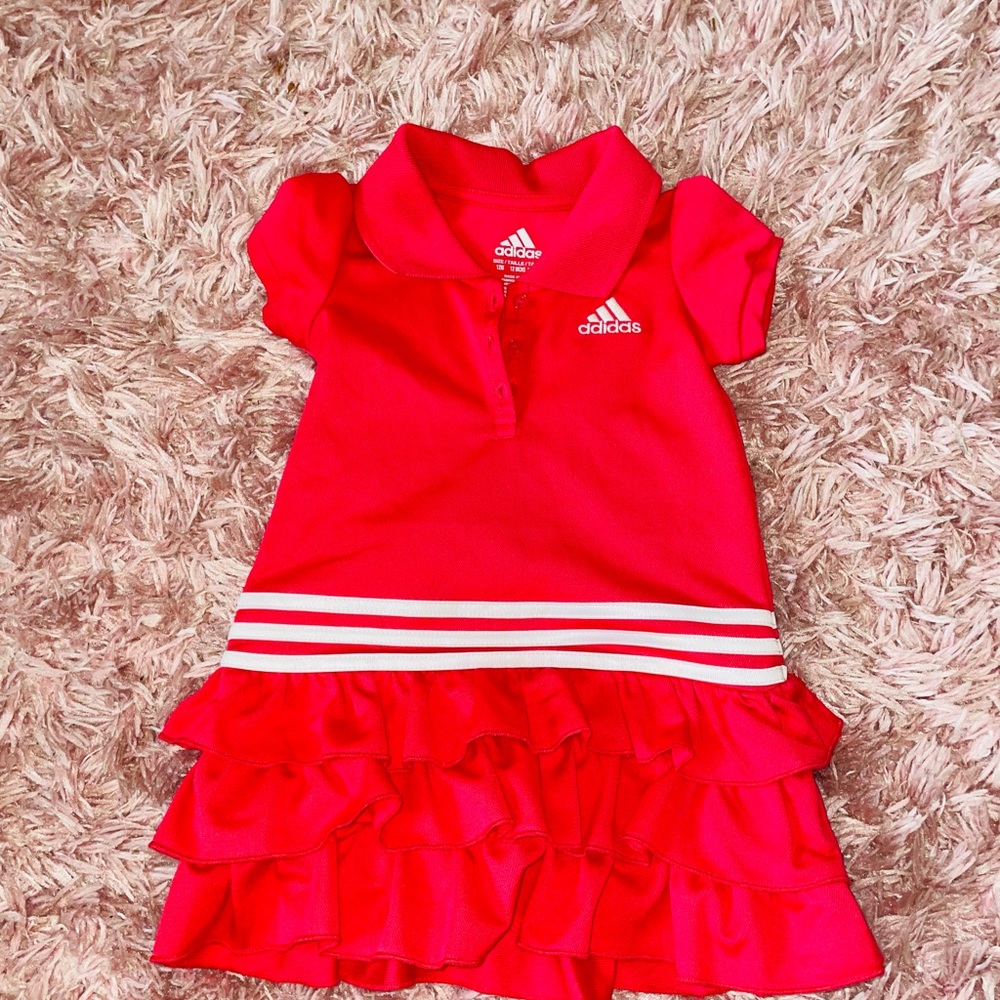 Infant Adidas Tennis Dress Size 12months. The color is more like fruit punch.